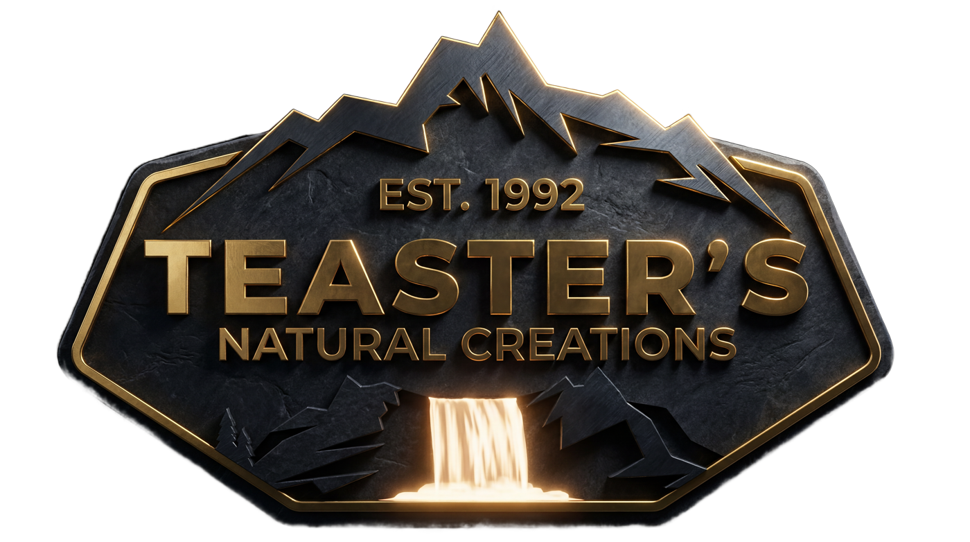 Teaster's Natural Creations — carved stone and gold emblem
